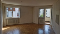 Wohnzimmer - 2-Zimmerwohnung in Bestlage in der Ulmer Innenstadt mit Tiefgaragenstellplatz