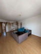 Wohnzimmer - Gemütliche 3-Zimmer-Wohnung mit großem Balkon und EBK in Illertissen