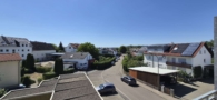 Ausblick Balkon - Wohnen über zwei Ebenen: Helle 3,5-Zimmer-Maisonette mit Dachterrasse und Münsterblick
