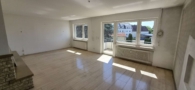 Wohnzimmer - Wohnen über zwei Ebenen: Helle 3,5-Zimmer-Maisonette mit Dachterrasse und Münsterblick