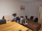 Wohnzimmer - Kapitalanlage! 3-Zimmer Wohnung mit Balkon, zentral in Neu-Ulm Stadtmitte