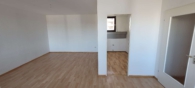 Wohnzimmer - Wundervolle 2-Zi-Wohnung in NU/Offenh. mit Balkon und Tiefgaragenstellplatz